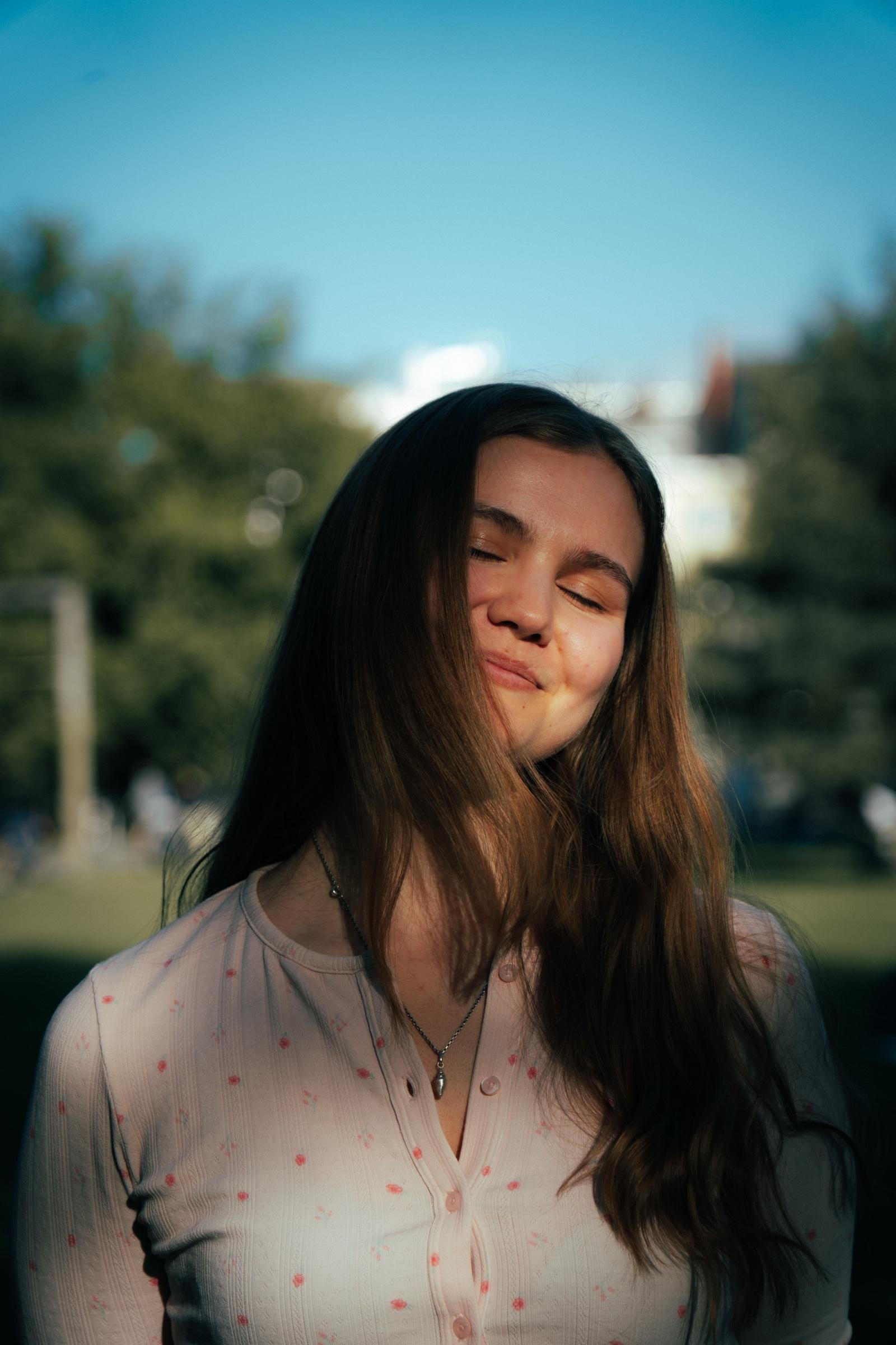 Portrait at golden hour, eyes closed